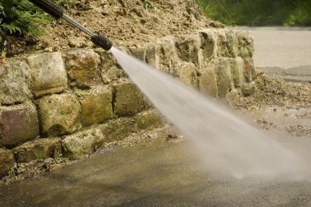 Driveway washing how to remove black algae rust and fertilizer stains safely